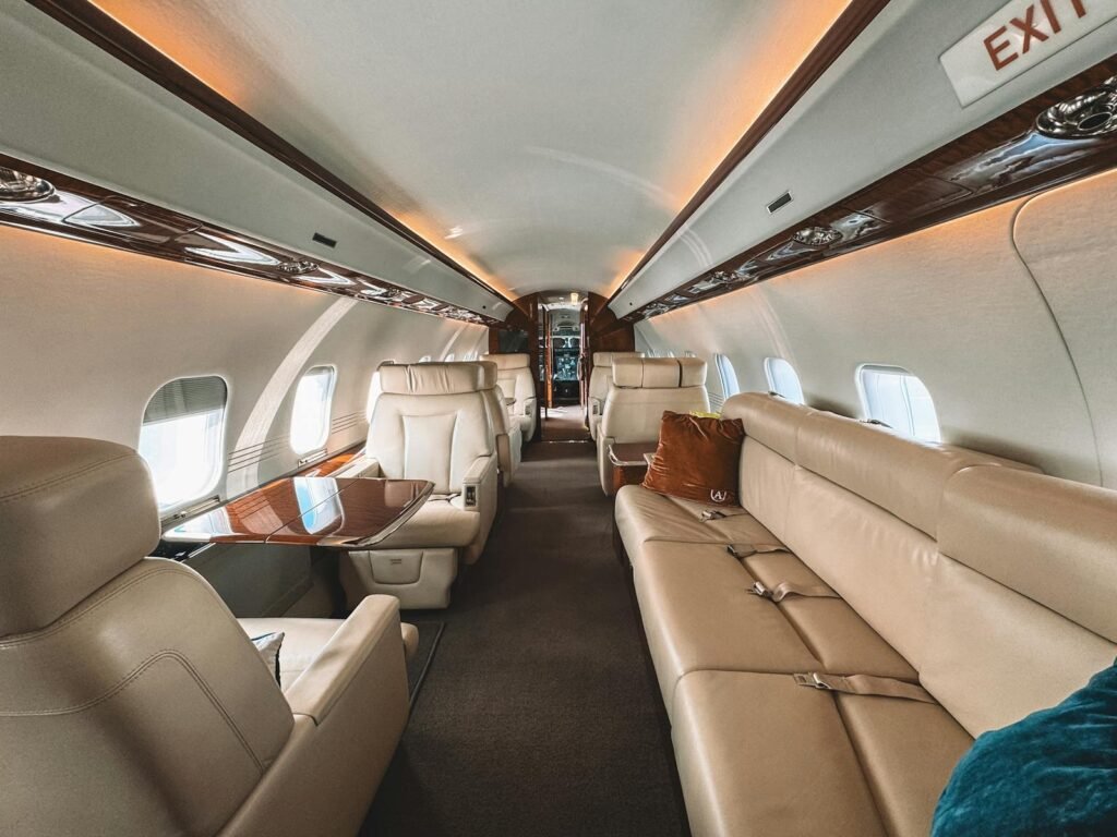A high-resolution, ultra-realistic photo of a small private plane's interior, showcasing the intricate details that affect its overall cost beyond the initial sticker price. The foreground features the plane's cockpit, with the pilot's seat, control panel, and advanced avionics system prominently displayed. The middle ground highlights the plane's pristine condition, with gleaming leather seats and a well-maintained cabin. In the background, a cutaway view reveals the inner workings of the aircraft, including the engine, landing gear, and maintenance timeline components. The lighting is natural and soft, creating a sense of depth and realism. The composition emphasizes the delicate balance between form, function, and financial considerations in the world of private aviation. photo of a small private plane's interior, showcasing the intricate details that affect its overall cost beyond the initial sticker price. The foreground features the plane's cockpit, with the pilot's seat, control panel, and advanced avionics system prominently displayed. The middle ground highlights the plane's pristine condition, with gleaming leather seats and a well-maintained cabin. In the background, a cutaway view reveals the inner workings of the aircraft, including the engine, landing gear, and maintenance timeline components. The lighting is natural and soft, creating a sense of depth and realism. The composition emphasizes the delicate balance between form, function, and financial considerations in the world of private aviation.