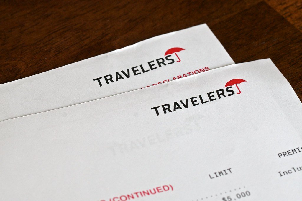 A high-resolution, hyper-detailed photograph of a Schengen travel insurance document with a stack of bank statements and account balances on a wooden table. The insurance certificate is prominently featured, with its logo, policy number, and coverage details clearly visible. The bank statements are neatly arranged, showcasing a healthy financial history. Warm, diffused lighting illuminates the scene, creating a sense of professionalism and credibility. The background is a neutral, uncluttered setting, allowing the financial documents to be the focal point. The overall composition conveys the importance of these essential Schengen visa requirements. photograph of a Schengen travel insurance document with a stack of bank statements and account balances on a wooden table. The insurance certificate is prominently featured, with its logo, policy number, and coverage details clearly visible. The bank statements are neatly arranged, showcasing a healthy financial history. Warm, diffused lighting illuminates the scene, creating a sense of professionalism and credibility. The background is a neutral, uncluttered setting, allowing the financial documents to be the focal point. The overall composition conveys the importance of these essential Schengen visa requirements.