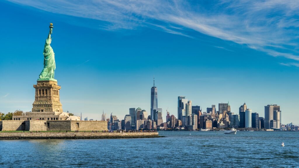  Statue of Liberty standing tall as one of manhattan landmarks