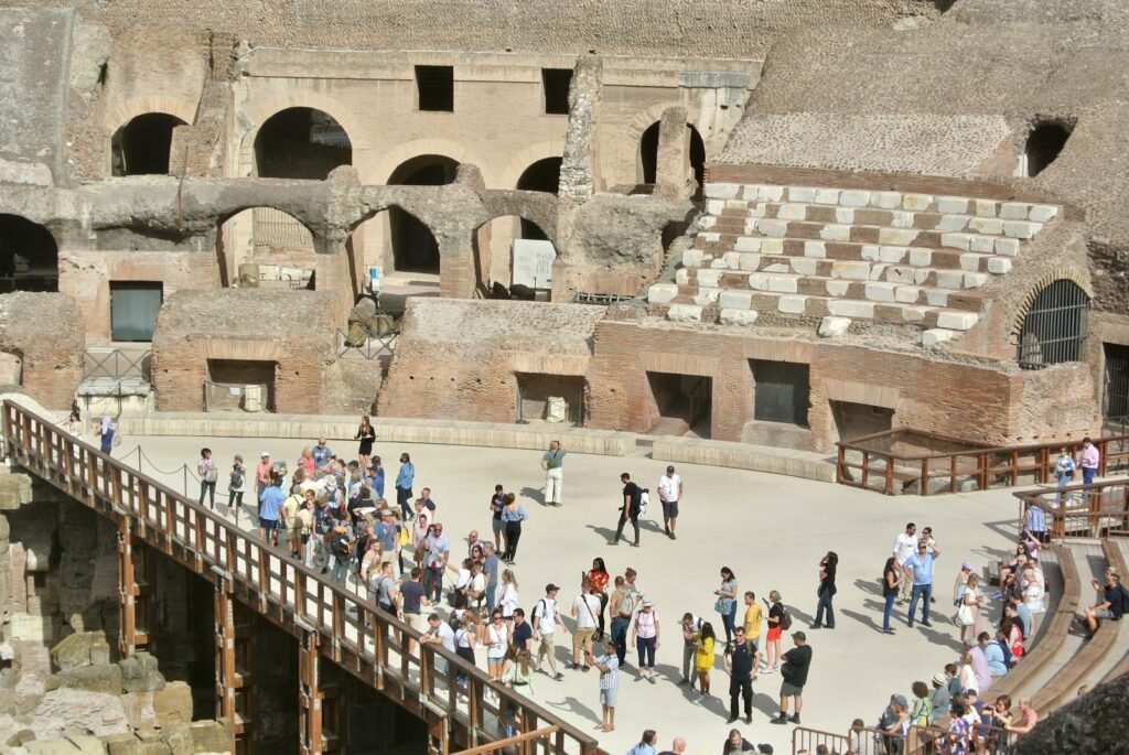 pompeii day tour pompeii day tour, a group of people in a large building