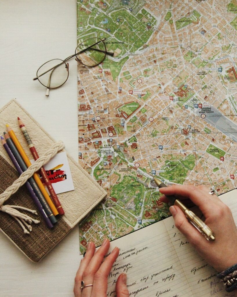 A detailed, month-by-month seasonal guide to South America, displayed on a wooden table. In the foreground, a hand points to different sections of the guide, guiding the viewer. The middle ground features the open guide, with vivid illustrations and informative text about each month's weather, events, and travel recommendations. The background shows a warm, natural-light setting, with potted plants and other decorative elements creating a welcoming, informative atmosphere. The overall composition conveys a sense of helpful, practical guidance for planning the best time to visit South America. A detailed, month-by-month seasonal guide to South America, displayed on a wooden table. In the foreground, a hand points to different sections of the guide, guiding the viewer. The middle ground features the open guide, with vivid illustrations and informative text about each month's weather, events, and travel recommendations. The background shows a warm, natural-light setting, with potted plants and other decorative elements creating a welcoming, informative atmosphere. The overall composition conveys a sense of helpful, practical guidance for planning the best time to visit South America.