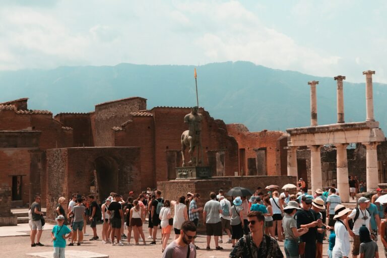 pompeii day tour, people standing near brown concrete building during daytime