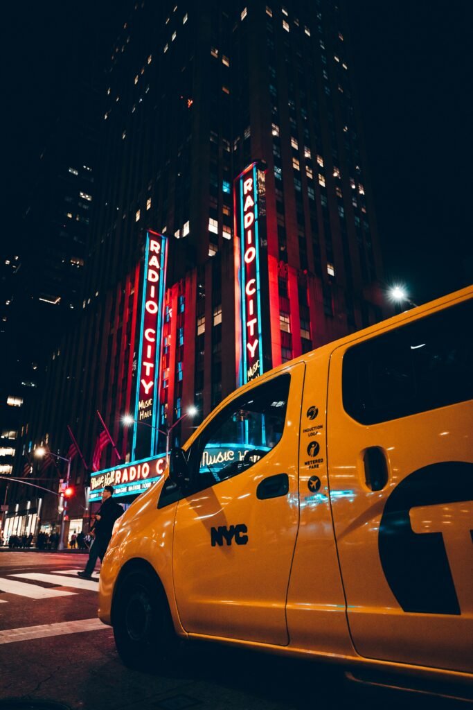 yellow cab at pedestrian crossing in new york city