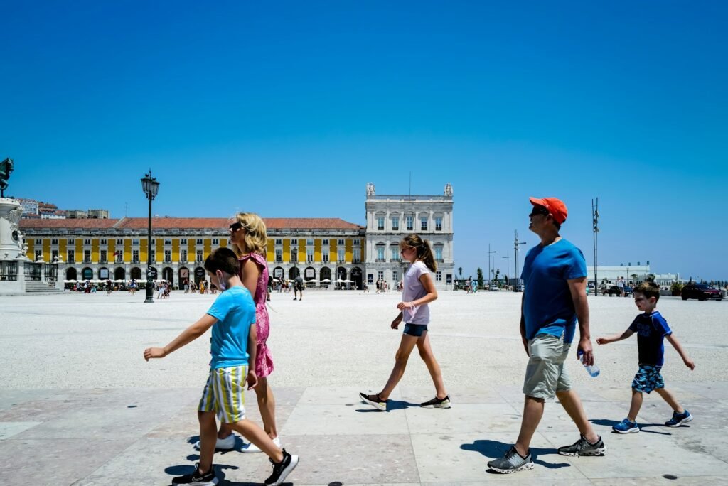 A bustling cityscape with iconic landmarks in the background, showcasing a traveler exploring the vibrant streets while holding various city passes and discount cards. In the foreground, a young person navigates a map, planning their budget-friendly adventures. The scene is bathed in warm, golden hour light, capturing the excitement and discovery of exploring Europe on a shoestring. The composition emphasizes the balance between the grand architecture and the individual's experience, conveying the essence of "City Passes and Free Activities: how to visit europe on a budget". A bustling cityscape with iconic landmarks in the background, showcasing a traveler exploring the vibrant streets while holding various city passes and discount cards. In the foreground, a young person navigates a map, planning their budget-friendly adventures. The scene is bathed in warm, golden hour light, capturing the excitement and discovery of exploring Europe on a shoestring. The composition emphasizes the balance between the grand architecture and the individual's experience, conveying the essence of "City Passes and Free Activities: how to visit europe on a budget".