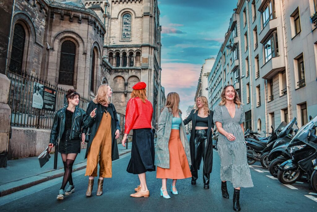 A vibrant street scene in Paris, France, showcasing the planning tips for an engaging walking food tour. In the foreground, a group of tourists, dressed for the occasion, stand before a cozy French café, examining a map and brochure. The middle ground reveals a bustling sidewalk lined with inviting bakeries, cheese shops, and wine bars, their windows displaying tempting delicacies. In the background, the iconic architecture of Paris, including the Eiffel Tower, provides a stunning backdrop, bathed in warm, golden afternoon light. The overall atmosphere exudes a sense of anticipation and culinary exploration, highlighting the key considerations for planning the perfect Parisian food walking tour. A vibrant street scene in Paris, France, showcasing the planning tips for an engaging walking food tour. In the foreground, a group of tourists, dressed for the occasion, stand before a cozy French café, examining a map and brochure. The middle ground reveals a bustling sidewalk lined with inviting bakeries, cheese shops, and wine bars, their windows displaying tempting delicacies. In the background, the iconic architecture of Paris, including the Eiffel Tower, provides a stunning backdrop, bathed in warm, golden afternoon light. The overall atmosphere exudes a sense of anticipation and culinary exploration, highlighting the key considerations for planning the perfect Parisian food walking tour.