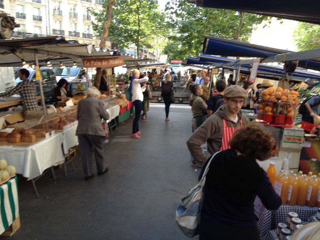 A bustling Parisian street scene, bathed in warm, golden light. In the foreground, a group of people eagerly exploring a local outdoor food market, browsing vibrant produce stalls and sampling delectable street food. In the middle ground, historic Haussmannian buildings line the sidewalks, their ornate facades creating a picturesque backdrop. The atmosphere is lively and inviting, with the aroma of freshly baked bread and simmering sauces wafting through the air. A sense of joie de vivre permeates the scene, capturing the essence of a quintessential Parisian food walking tour. A bustling Parisian street scene, bathed in warm, golden light. In the foreground, a group of people eagerly exploring a local outdoor food market, browsing vibrant produce stalls and sampling delectable street food. In the middle ground, historic Haussmannian buildings line the sidewalks, their ornate facades creating a picturesque backdrop. The atmosphere is lively and inviting, with the aroma of freshly baked bread and simmering sauces wafting through the air. A sense of joie de vivre permeates the scene, capturing the essence of a quintessential Parisian food walking tour.