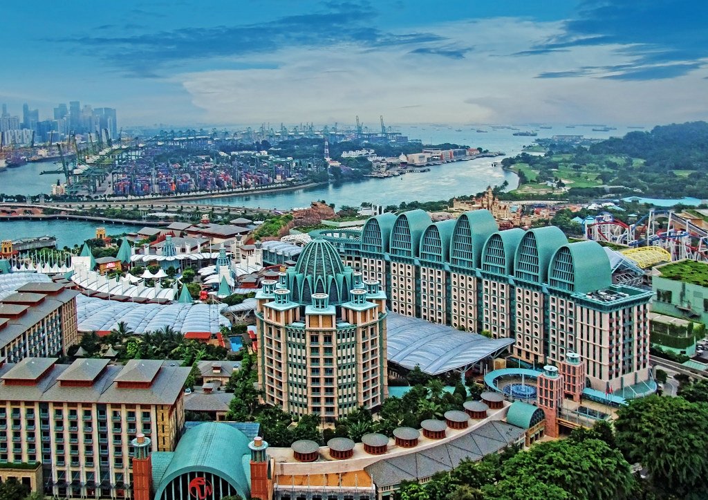 A sweeping aerial vista of hotels across the globe, from towering city skyscrapers to quaint seaside resorts. The scene is illuminated by warm, golden sunlight filtering through wispy clouds, casting a serene glow over the diverse architectural styles and landscapes. In the foreground, a cluster of modern high-rise hotels stand tall, their reflective glass facades mirroring the surrounding cityscapes. In the middle ground, picturesque coastal hotels dot the shoreline, their white-washed walls and red-tiled roofs nestled amidst lush greenery. The background reveals a tapestry of mountains, forests, and bodies of water, showcasing the vast geographic reach and varied settings of hotels worldwide. The overall composition conveys a sense of global connectivity, diversity, and the boundless opportunities for travel and accommodation. A sweeping aerial vista of hotels across the globe, from towering city skyscrapers to quaint seaside resorts. The scene is illuminated by warm, golden sunlight filtering through wispy clouds, casting a serene glow over the diverse architectural styles and landscapes. In the foreground, a cluster of modern high-rise hotels stand tall, their reflective glass facades mirroring the surrounding cityscapes. In the middle ground, picturesque coastal hotels dot the shoreline, their white-washed walls and red-tiled roofs nestled amidst lush greenery. The background reveals a tapestry of mountains, forests, and bodies of water, showcasing the vast geographic reach and varied settings of hotels worldwide. The overall composition conveys a sense of global connectivity, diversity, and the boundless opportunities for travel and accommodation.