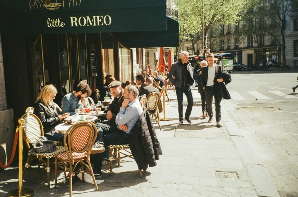A bustling Parisian street, bathed in warm, golden light from street lamps and cafe windows. In the foreground, a group of well-dressed tourists stands outside a charming, cobblestone-paved bistro, studying a map and brochures. The middle ground features a row of quaint, historic buildings adorned with wrought-iron balconies and Parisian-style awnings. In the background, the iconic Eiffel Tower looms, its silhouette silhouetted against a dusky, rose-tinted sky. The scene conveys the vibrant energy and timeless allure of Paris, inviting the viewer to embark on a culinary exploration of the city's renowned dining experiences. A bustling Parisian street, bathed in warm, golden light from street lamps and cafe windows. In the foreground, a group of well-dressed tourists stands outside a charming, cobblestone-paved bistro, studying a map and brochures. The middle ground features a row of quaint, historic buildings adorned with wrought-iron balconies and Parisian-style awnings. In the background, the iconic Eiffel Tower looms, its silhouette silhouetted against a dusky, rose-tinted sky. The scene conveys the vibrant energy and timeless allure of Paris, inviting the viewer to embark on a culinary exploration of the city's renowned dining experiences.