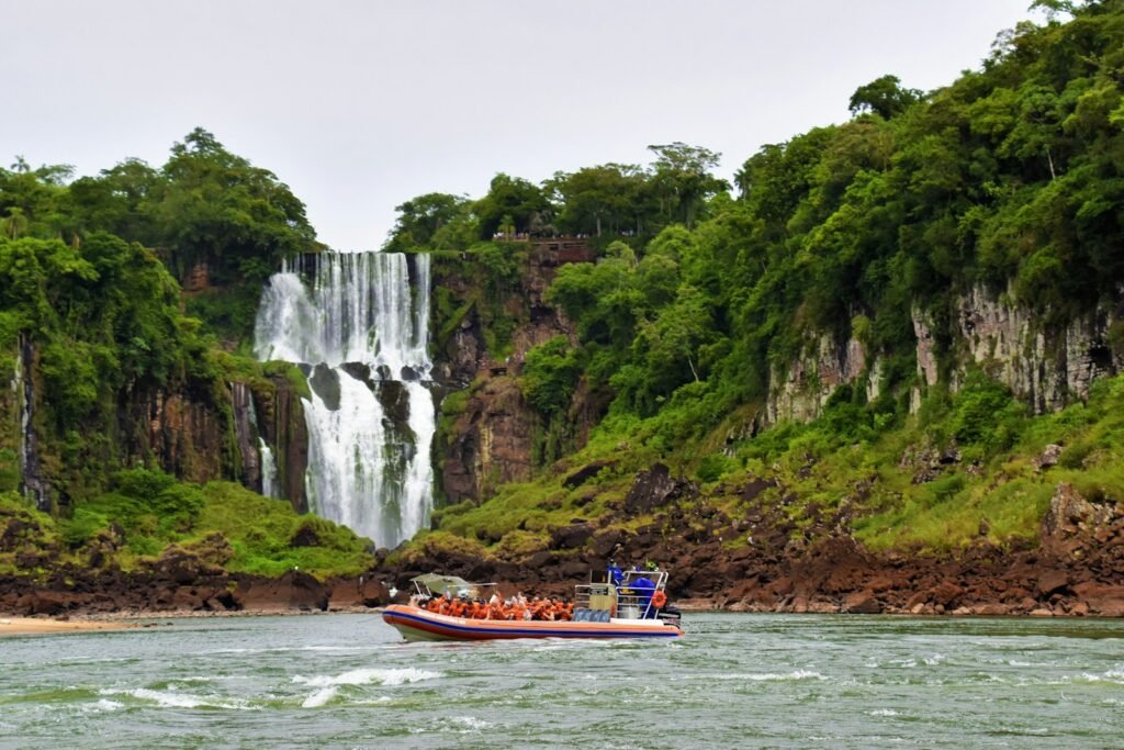 Travelers enjoying a scenic boat ride during Peru Amazon River Tours itinerary.
