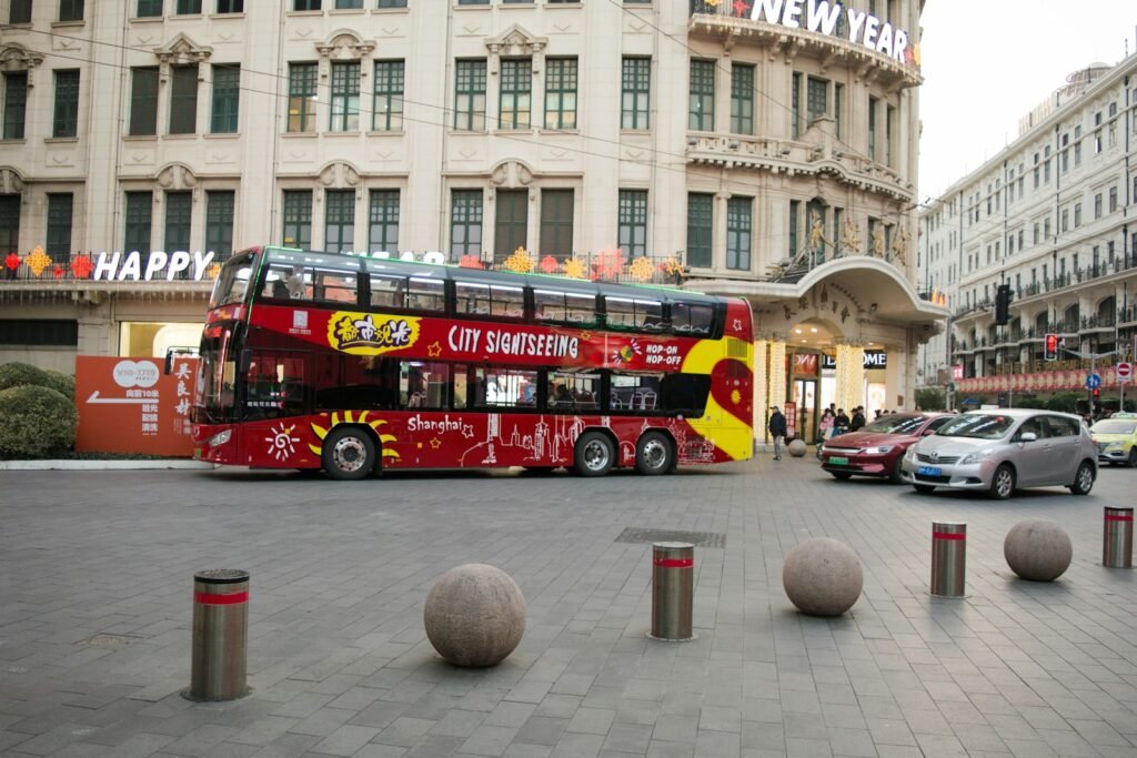 Exploring Europe: A Complete Guide to the Best Travel Experiences Red Big Bus Tours sightseeing bus in a European city, helping travelers explore Europe easily and map key attractions on day one.