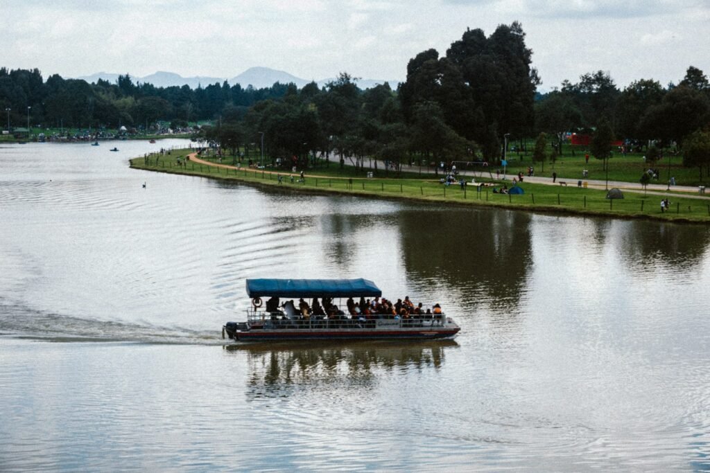 Travelers enjoying a scenic boat ride on the Peru Amazon River during a guided tour through the rainforest.